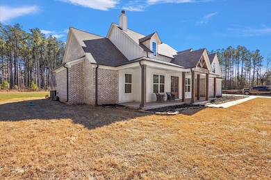 View of property exterior featuring board and batt