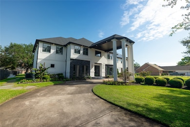 This is a spacious two-story home with a grand ent