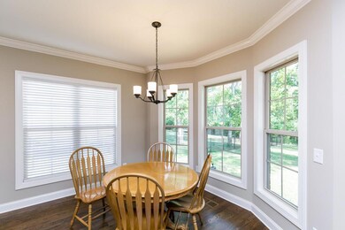 Dining area looks into very private back yard.
