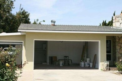 Large 2 car garage - attached door to kitchen is o