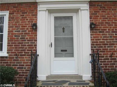 Exterior Front - Grand entry. Dbl lighting, iron r