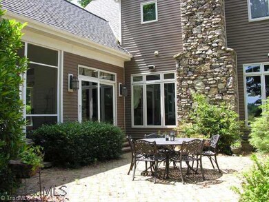 Other. Big paver patio can be reached from the breakfast room, screened porch, foyer and the master suite.