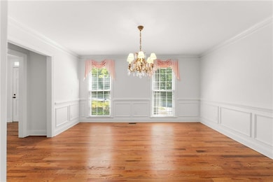 Formal Dining Room with wainscotting