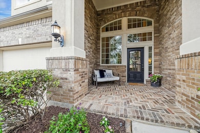 Charming front porch creates an inviting transitio