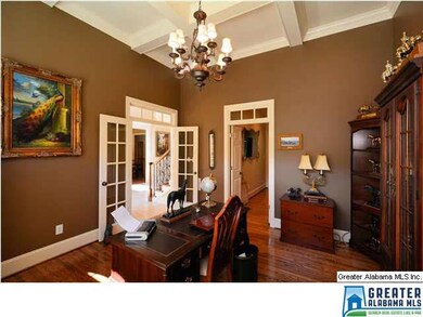 Study with french doors from the foyer and beautif