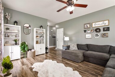 It's a beauty from every angle.  High ceilings, warm tone walls, luxury vinyl plank floor & an abundance of natural light!