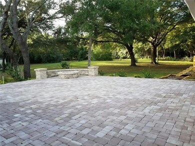 35' x 35' paver deck with firepit and built-in seating