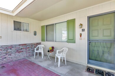 10417 W Kingswood Cir-large-003-019-Fron