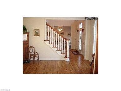 FORMAL LIVING ROOM AREA WITH OFFICE ADJACENT