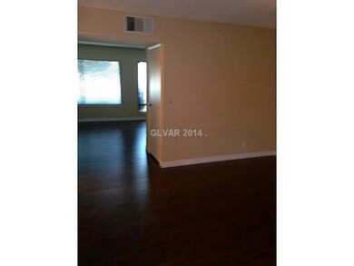 Property Photo. Living Room to Family Room