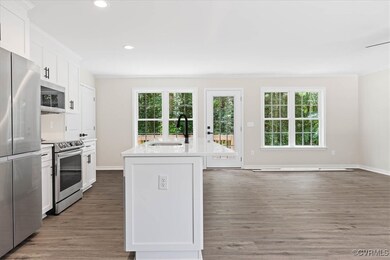 Kitchen with a sink, appliances with stainless ste
