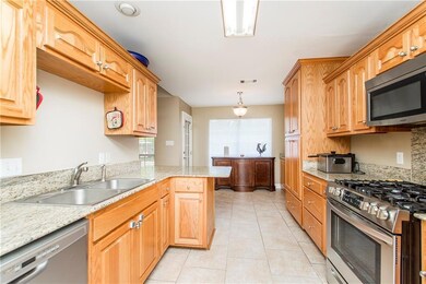 Kitchen with view to Breakfast area.