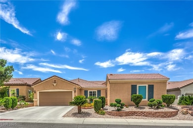 Ranch-style home featuring stucco siding, an attac