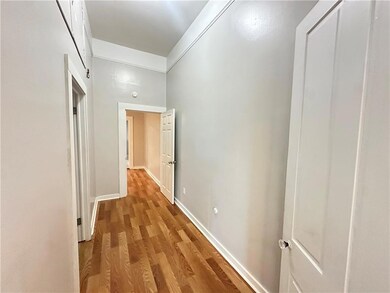 Hall between bedrooms (middle door is bathroom ent