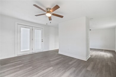 Dining room with new double doors and living room