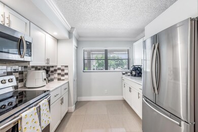 12926 Briarlake Dr unit 201, Palm Beach Gardens, FL 33418 - photo 3