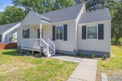 Bungalow-style home with roof with shingles