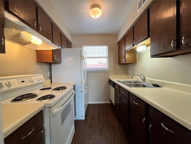 Here is the kitchen. Notice the stainless steel si