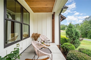 Covered front porch - big enough to sit and enjoy the day.