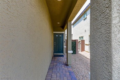 Entrance to property featuring stucco siding and a