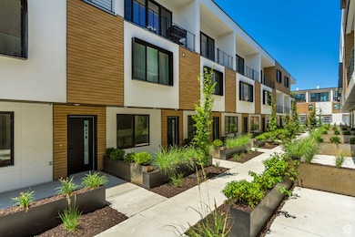 View of property with a residential view