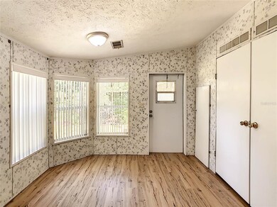 cozy breakfast nook area with outside access to th