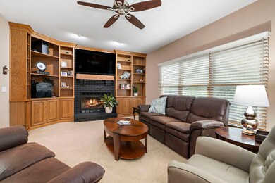 MAIN FLOOR FAMILY ROOM WITH BUILT INS