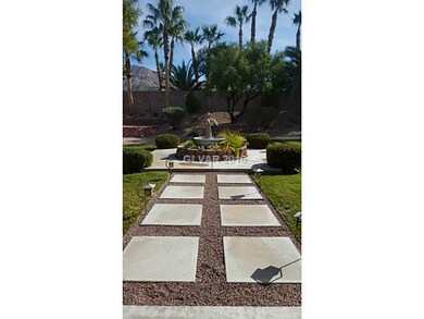 Property Photo. Back yard fountain