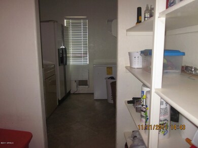 Massive walk-in pantry and laundry room