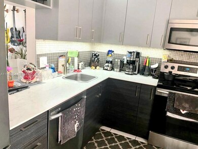 18900 NE 14th Ave unit D205, Miami, FL 33179 - photo 3