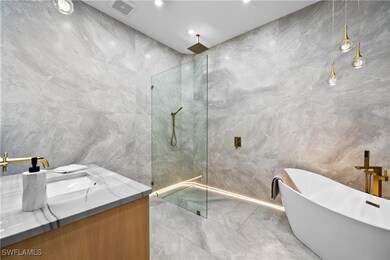 Bathroom featuring independent shower and bath, va