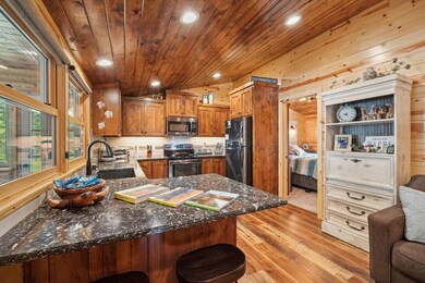 You will fall in love with this kitchen including soft close door/drawer, new appliances and an open design. Feel free to look through the books on the counter documenting the remodel process and fun at the lake, but please leave them there when done