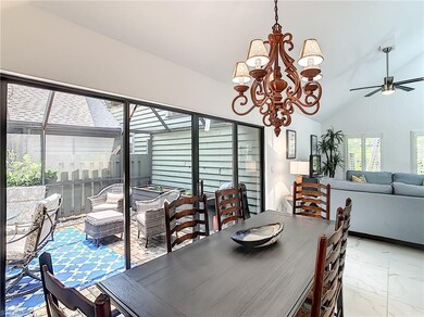 Dining area leading out to the screened in lanai.
