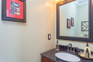 Downstairs half bath updated by current owners wit