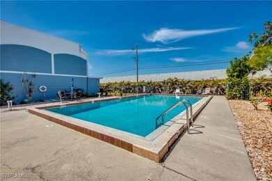 Pool featuring fence and a patio