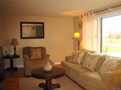 Very inviting living room with a large picture win