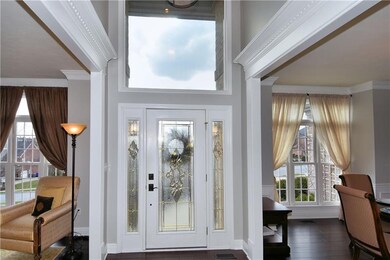 Enter through beveled and leaded glass doors.  Ove
