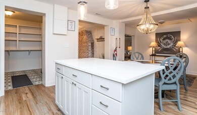 5. Kitchen into dining and entry view