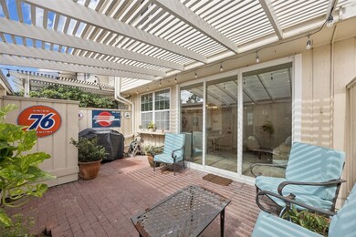 Charming outdoor living with pergola and space for