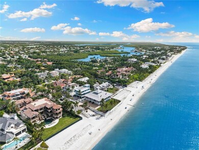 Aerial perspective of suburban area featuring unending shoreline