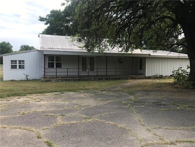 Great Front Porch with a huge shade tree!