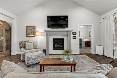 Living room featuring dark hardwood / wood-style f