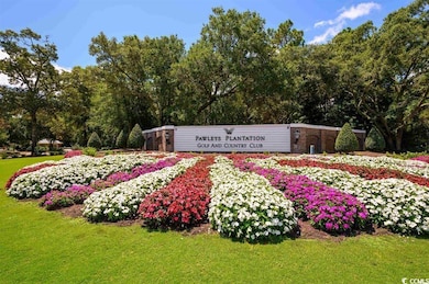 Community sign with a lawn