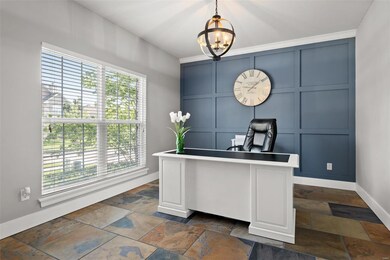 Large quiet office with beautiful ceramic tile flooring and feature wall.