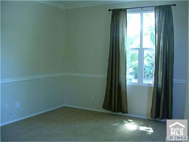 Bright living room with brand newer carpet & curta