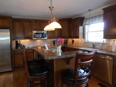 Kitchen w/cherry cabinets