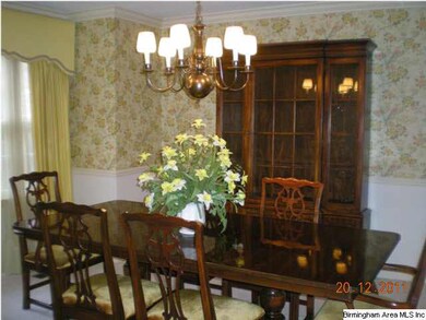 Formal dining room easily can seat 10 at the table