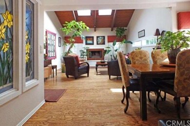 Formal living, formal dining, and all on hardwood 