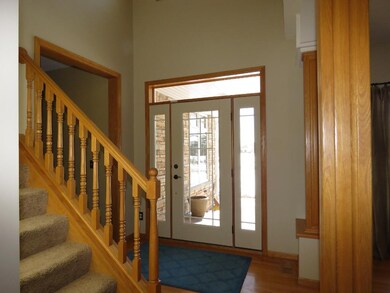 Roomy two-story foyer welcomes you inside and you 