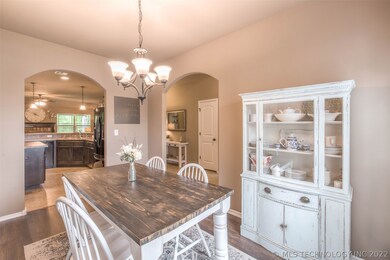 Formal dining has lovely wood floors, new paint an